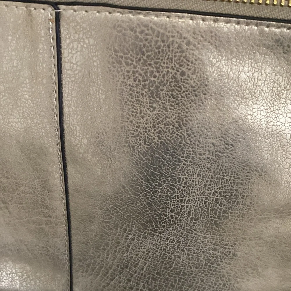 Gold wristlet clutch